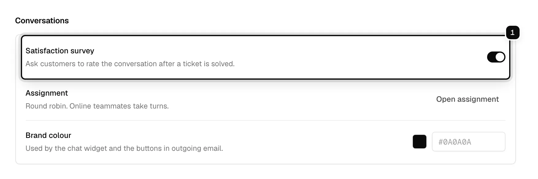 The Conversations section of the workspace settings, with the Satisfaction survey switch ringed as 1, on