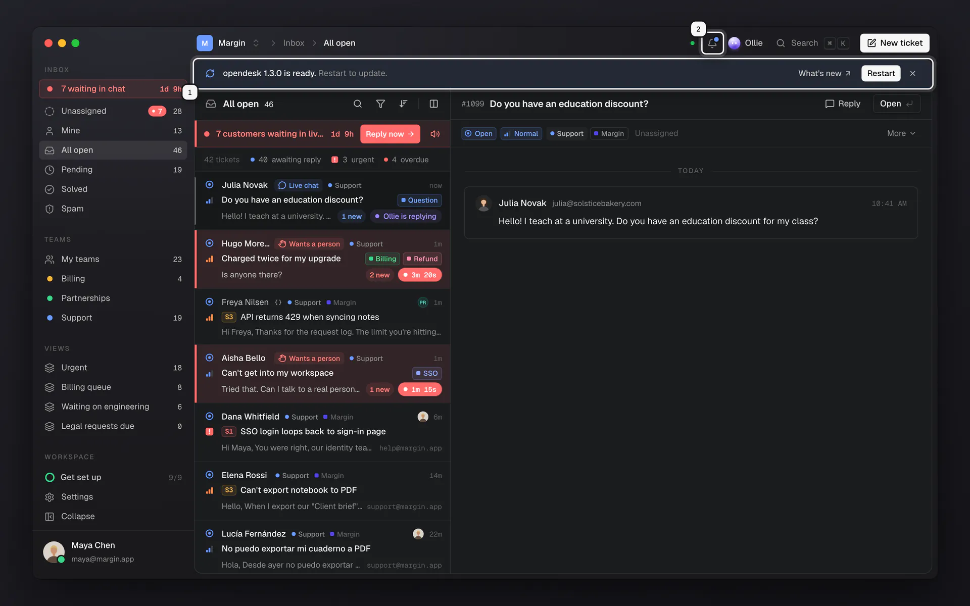 The opendesk desktop window on macOS showing the inbox, with the update strip ringed as 1 and the notifications bell ringed as 2