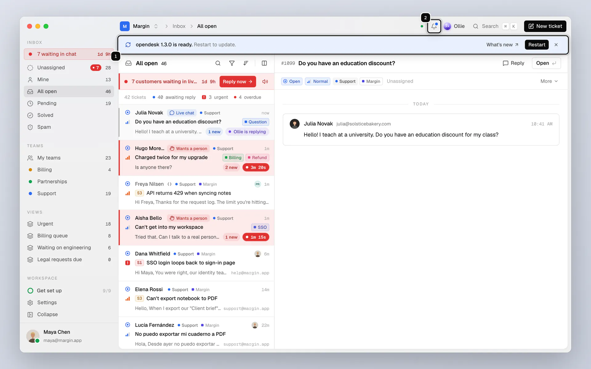 The opendesk desktop window on macOS showing the inbox, with the update strip ringed as 1 and the notifications bell ringed as 2